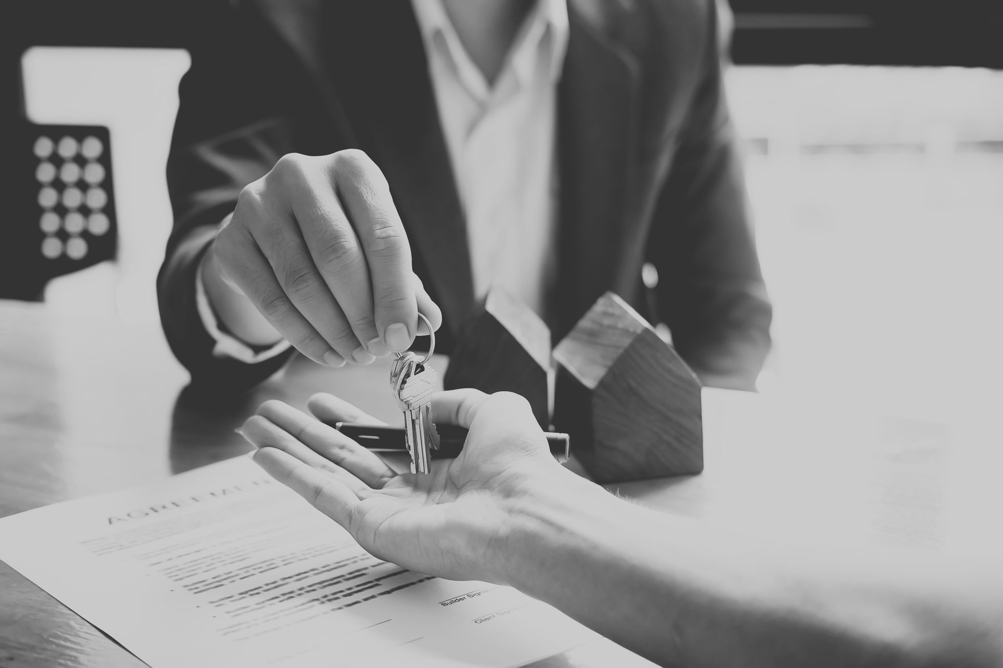 Real Estate Agent Giving Key to Client